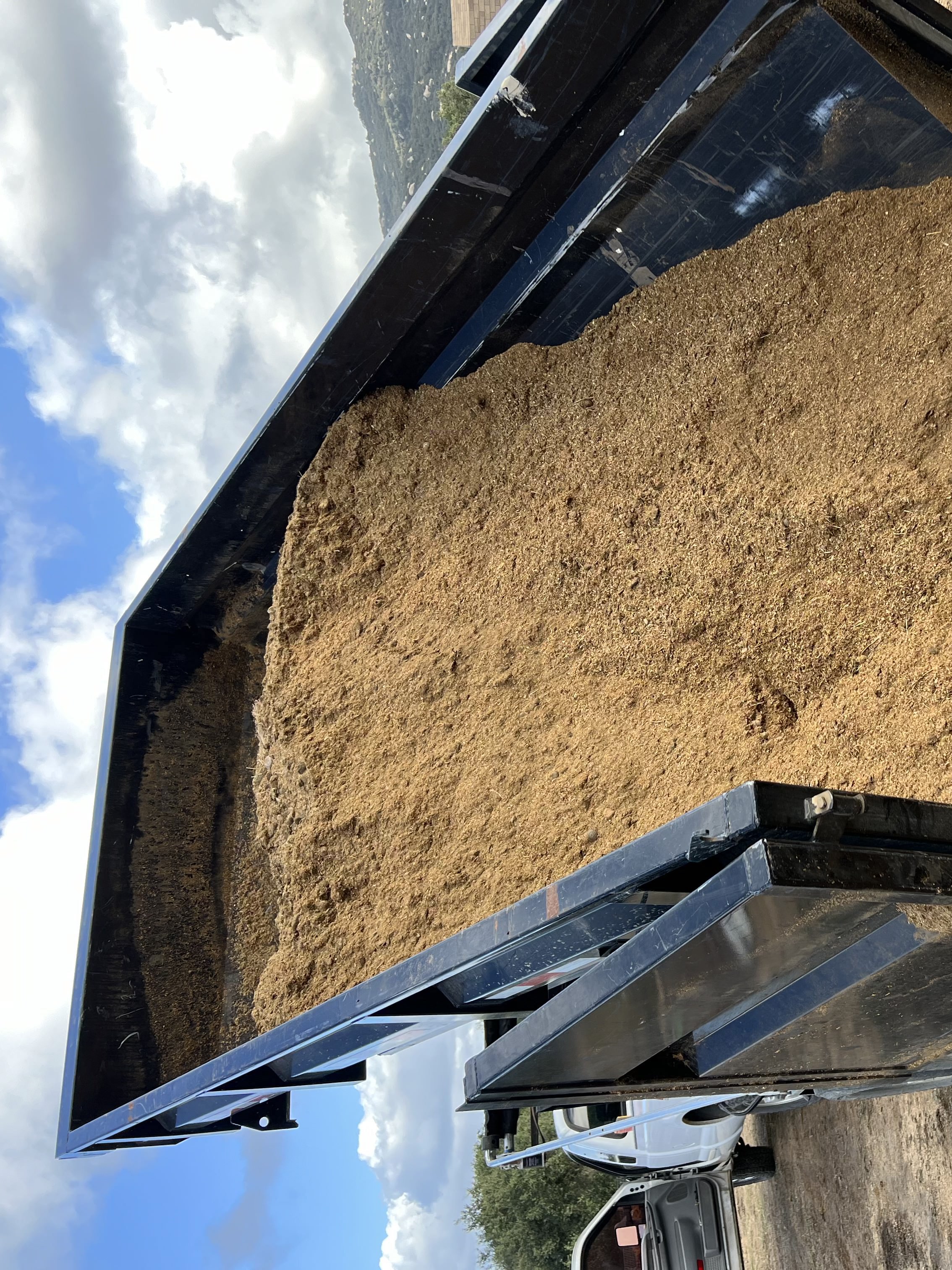 Manure disposal dumpster ready for agricultural waste in Riverside County